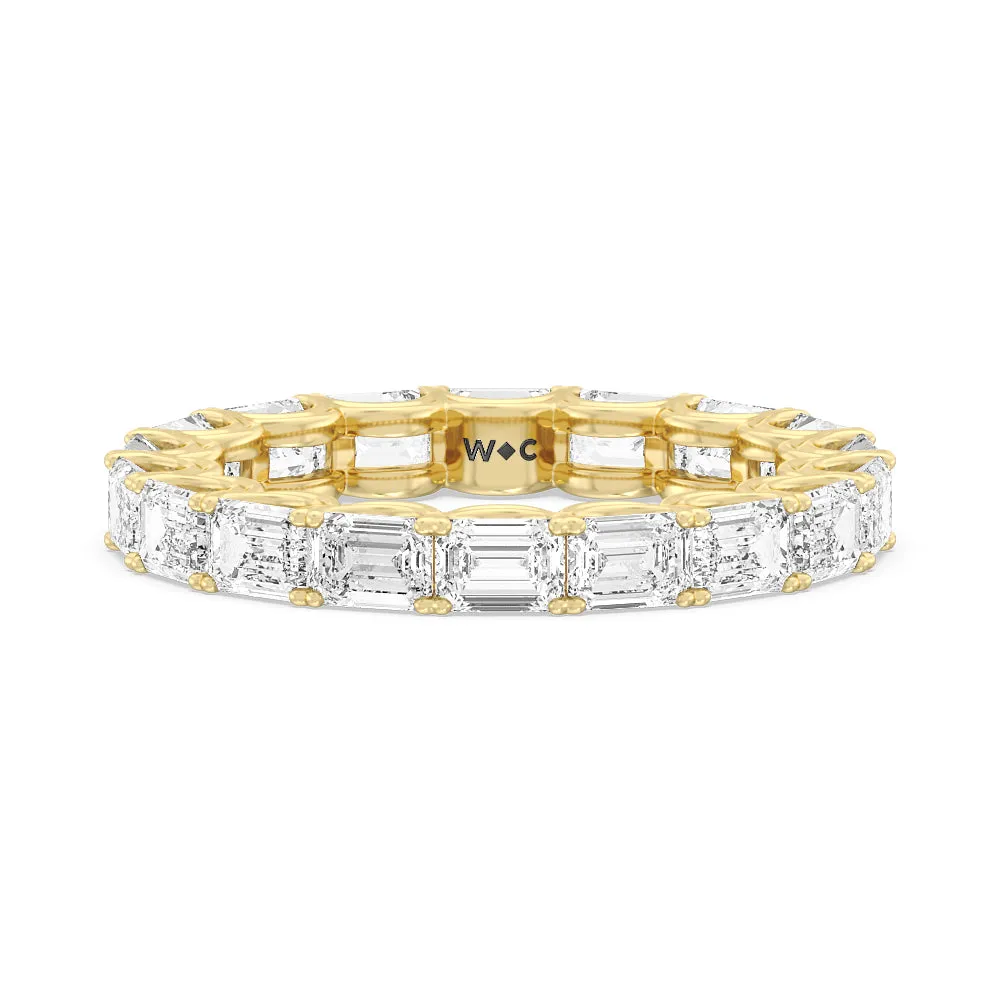 Emerald Split Prong Waves Eternity Ring