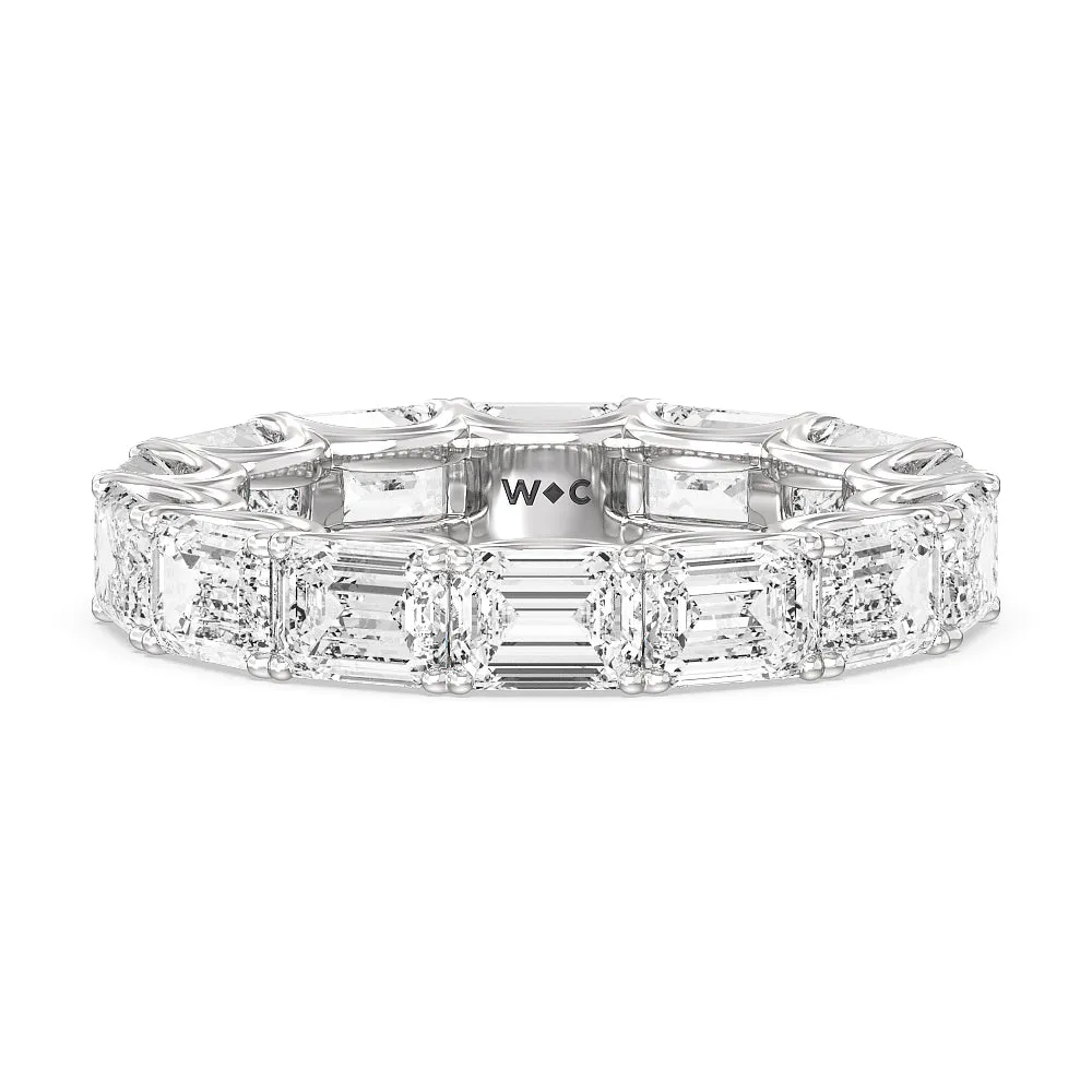 Emerald Split Prong Waves Eternity Ring