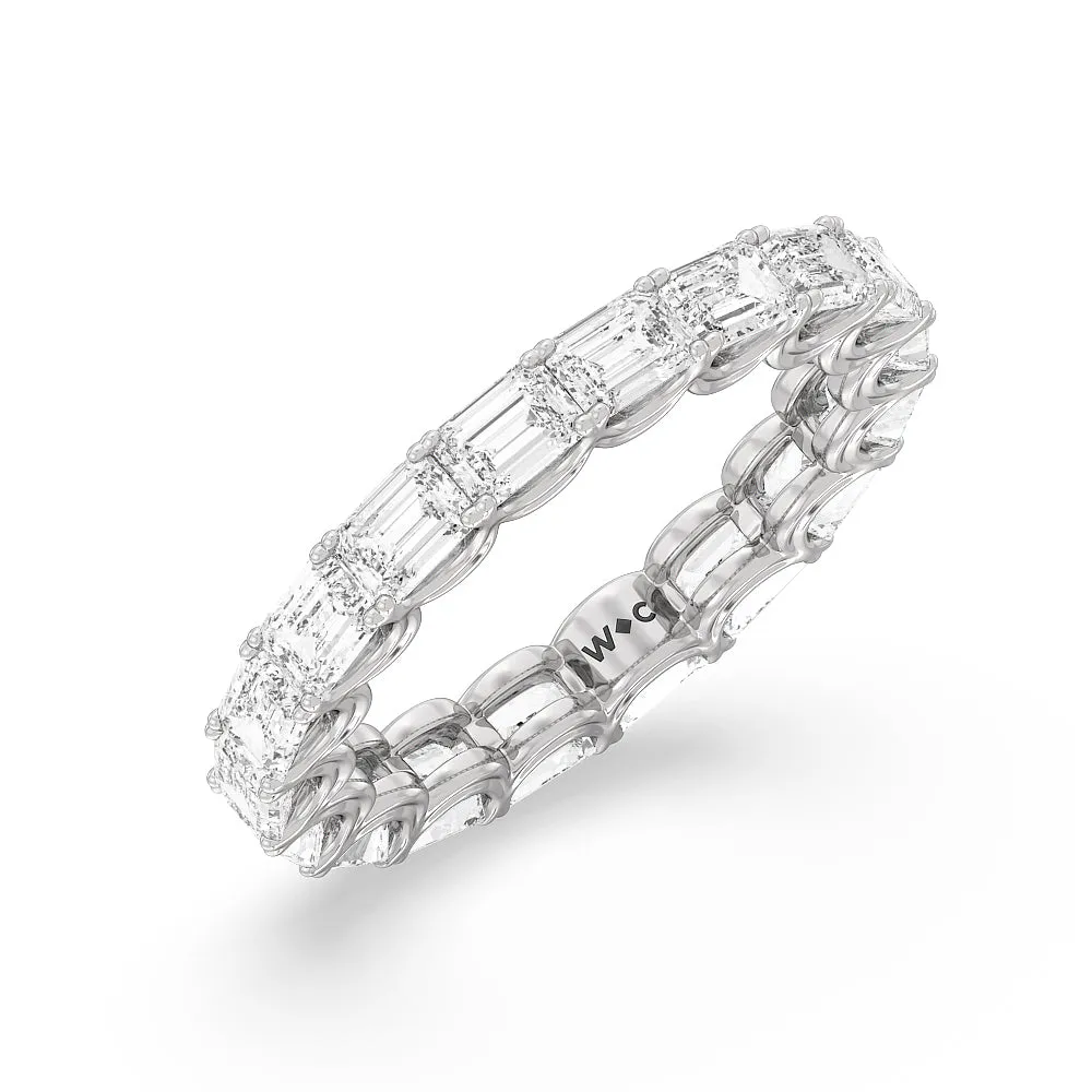 Emerald Split Prong Waves Eternity Ring