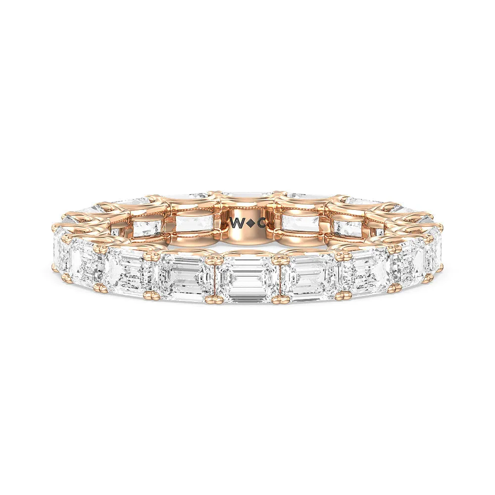 Emerald Split Prong Waves Eternity Ring