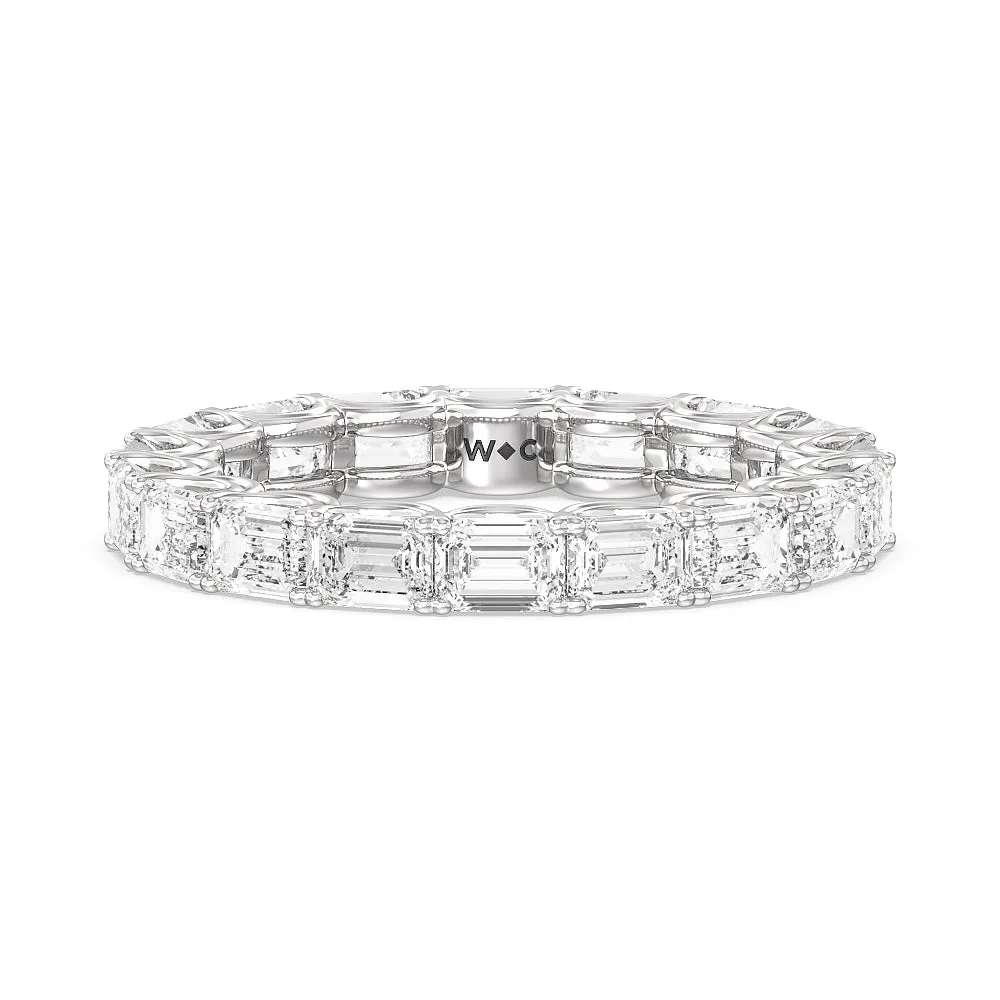 Emerald Split Prong Waves Eternity Ring