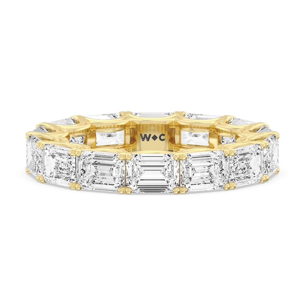 Emerald Split Prong Waves Eternity Ring