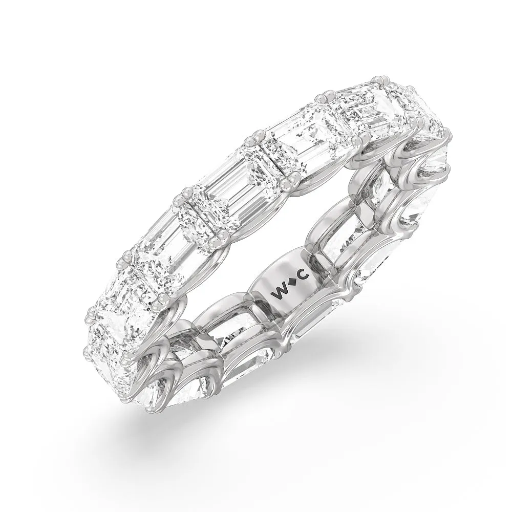 Emerald Split Prong Waves Eternity Ring