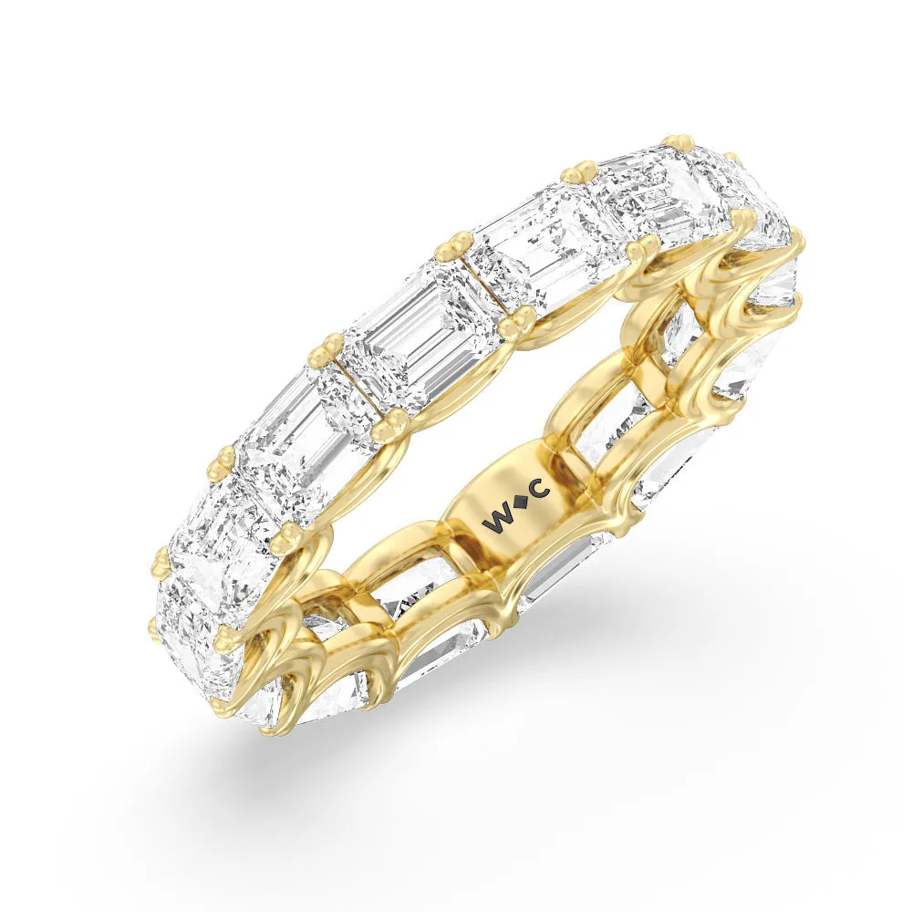 Emerald Split Prong Waves Eternity Ring