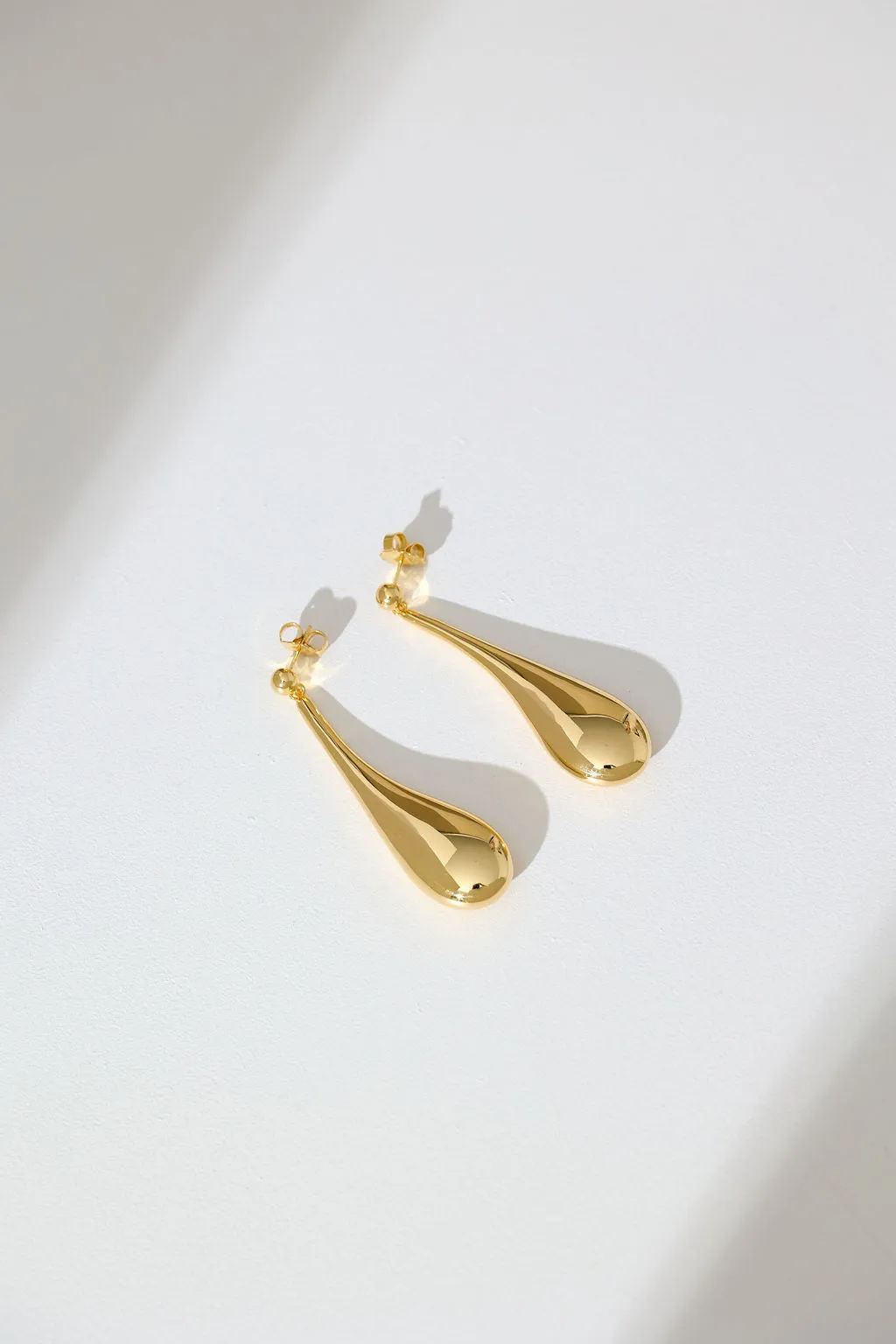 Long Hollow Form Tear Drop Earrings