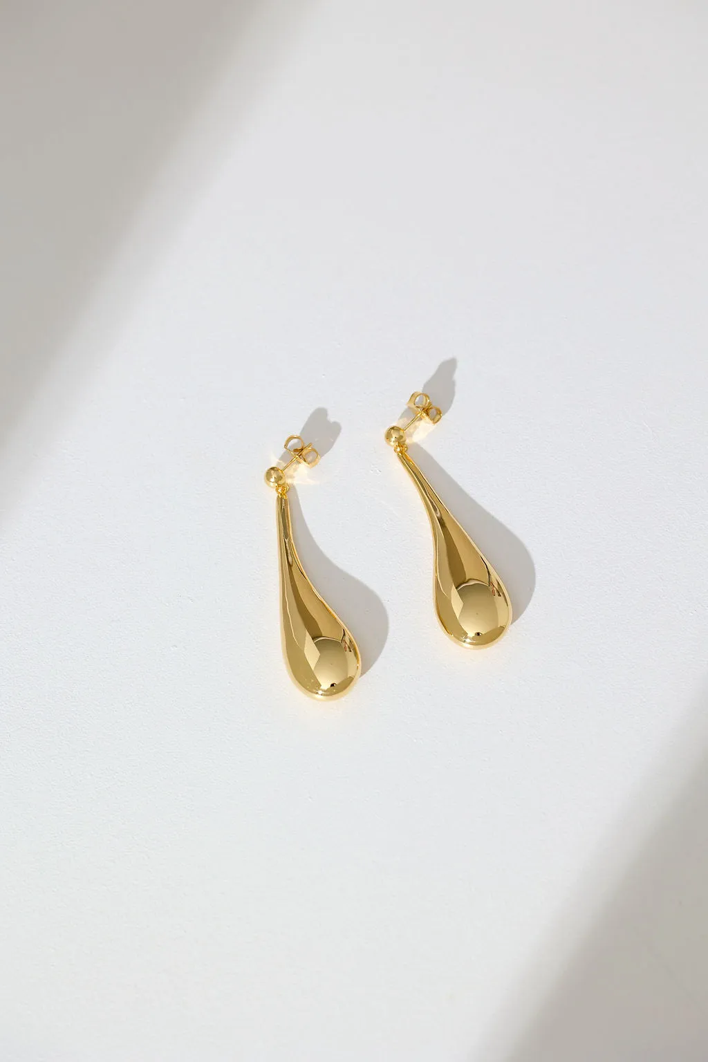 Long Hollow Form Tear Drop Earrings