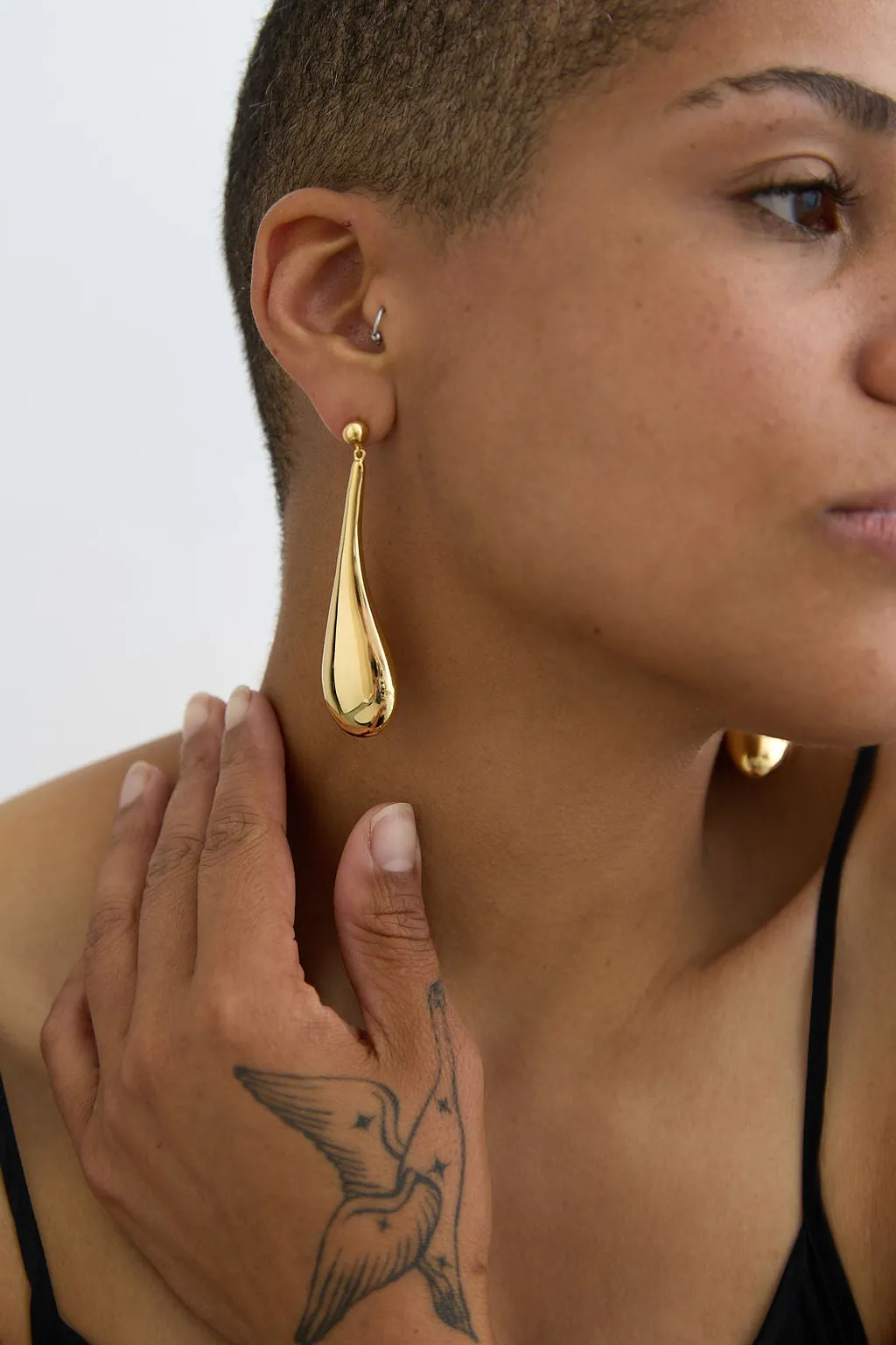 Long Hollow Form Tear Drop Earrings