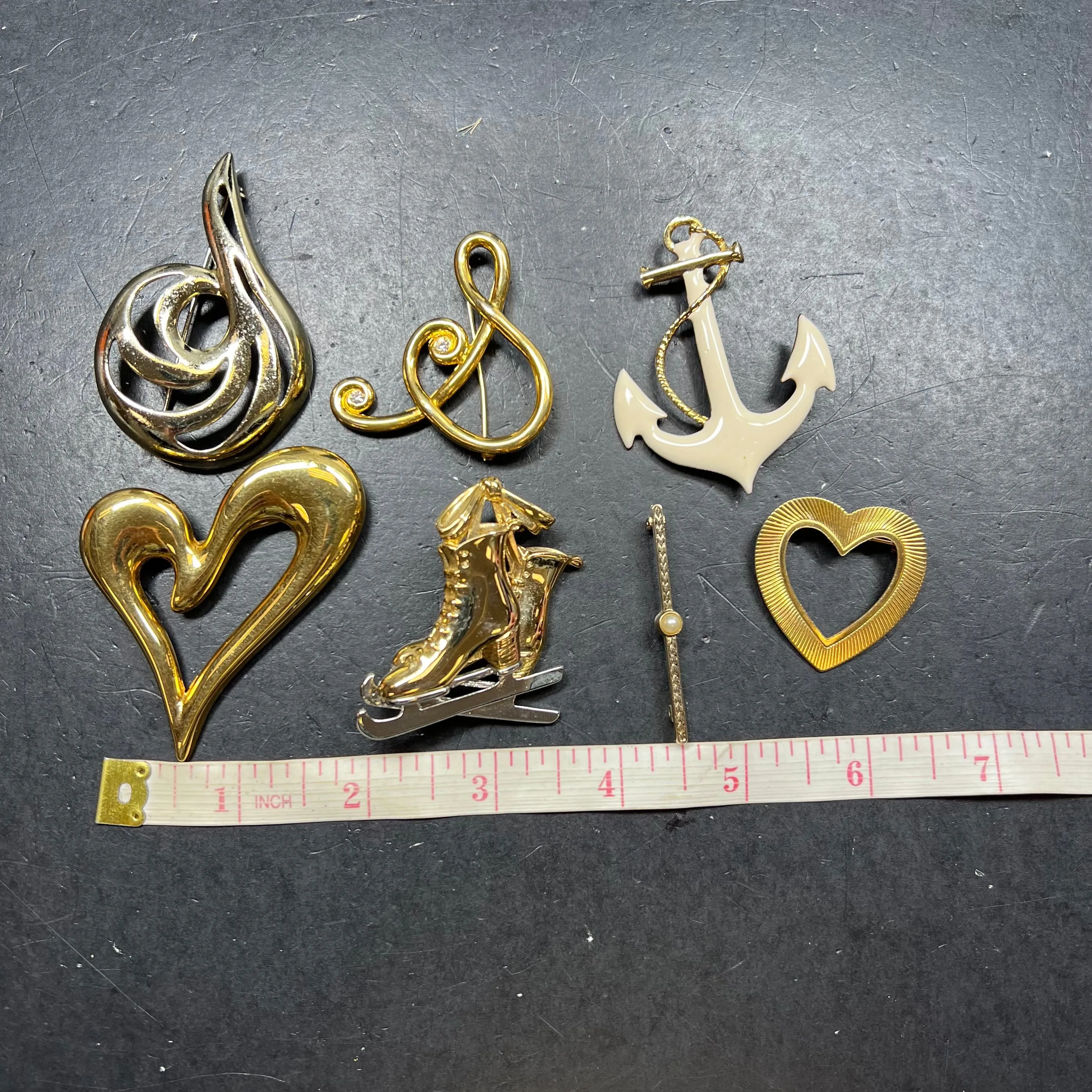 Lot of 7 Gold Tone Assorted Brooches