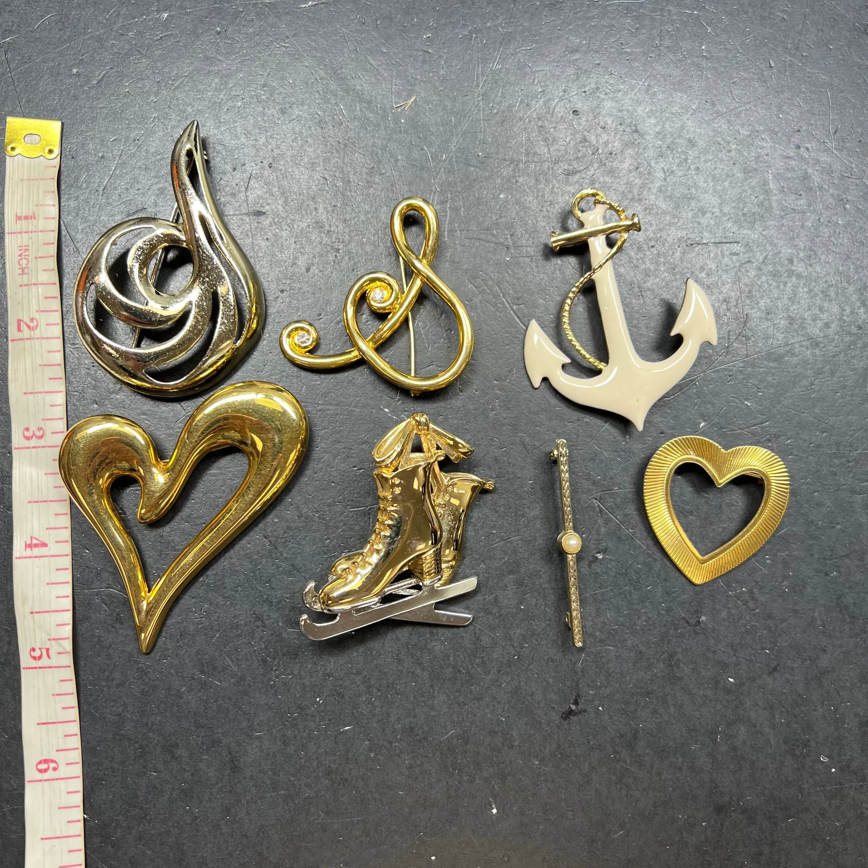 Lot of 7 Gold Tone Assorted Brooches
