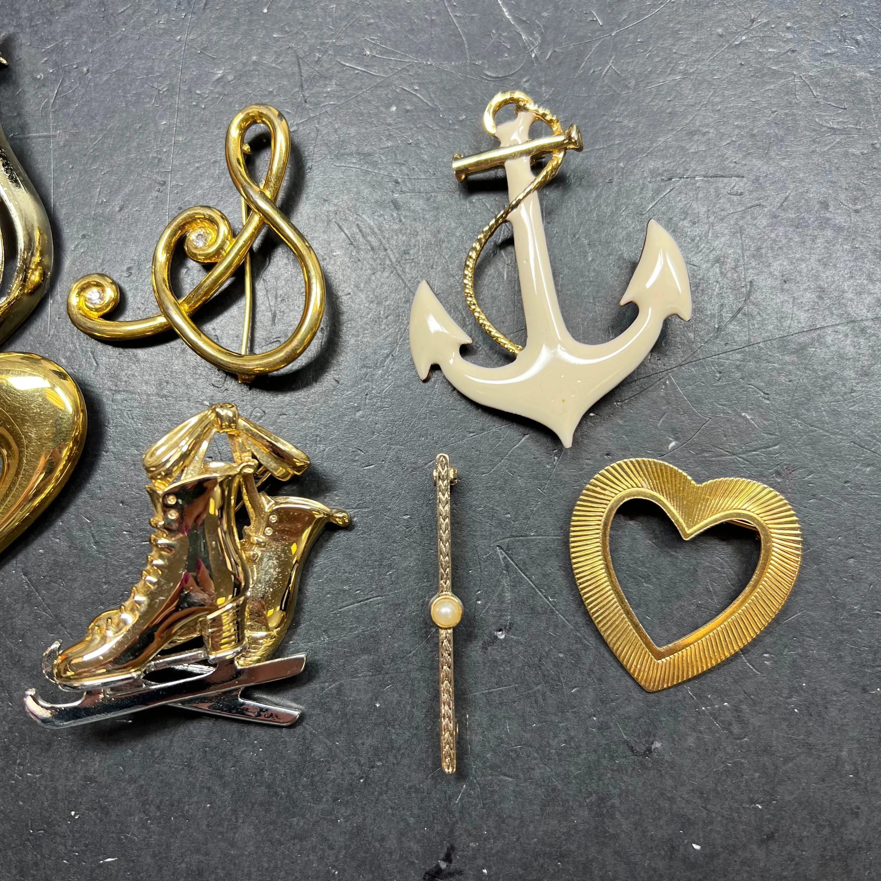 Lot of 7 Gold Tone Assorted Brooches