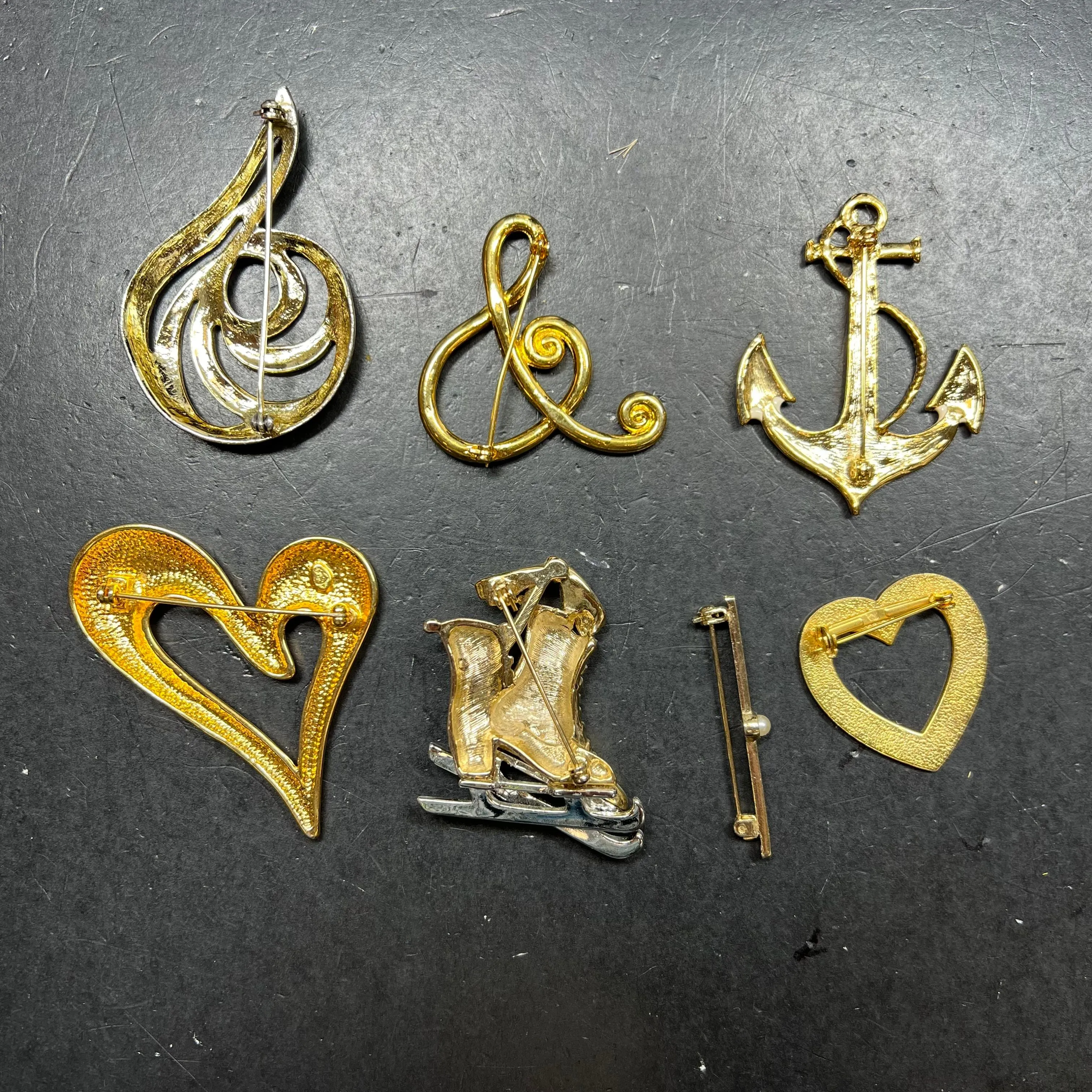 Lot of 7 Gold Tone Assorted Brooches