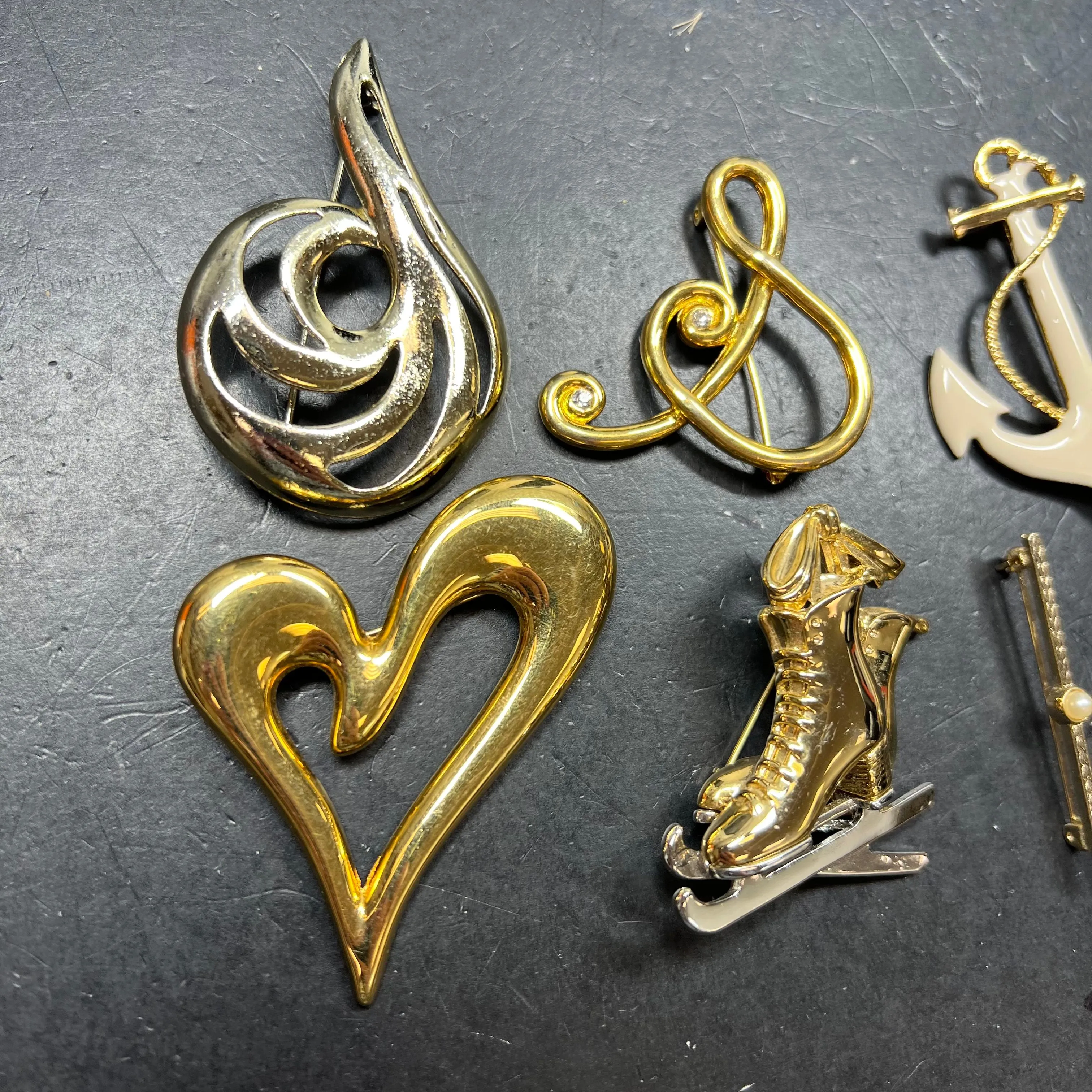 Lot of 7 Gold Tone Assorted Brooches